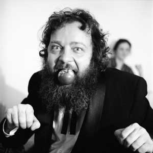 Blos, Stephen - Donald Hall with apple in his mouth #1